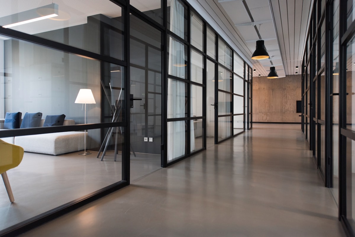 Managed workspace corridor with glass offices